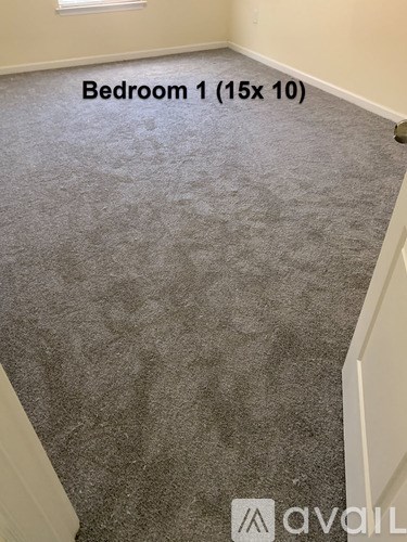 Bedroom 1 is 15x10 and has a carpeted floor.