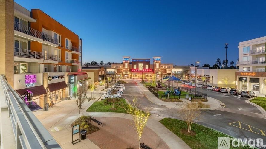 A view of a shopping center with a Civic Mall sign.