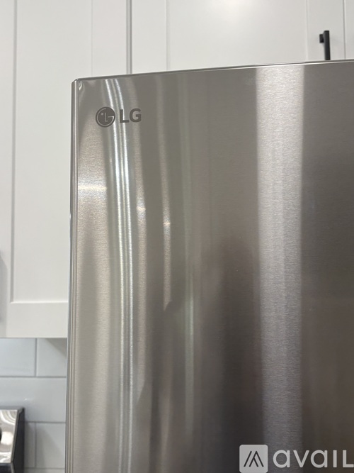 A stainless steel LG refrigerator in a kitchen.