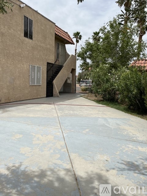 A house with a driveway in front of it.