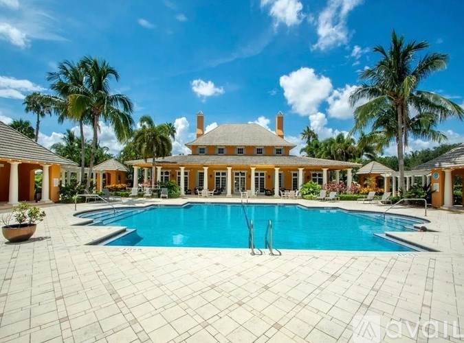 A large house with a pool in the backyard.