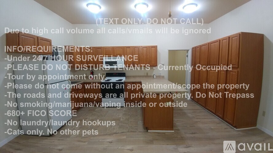 A sign in a room with wooden lockers outlines the rules and requirements for a property.