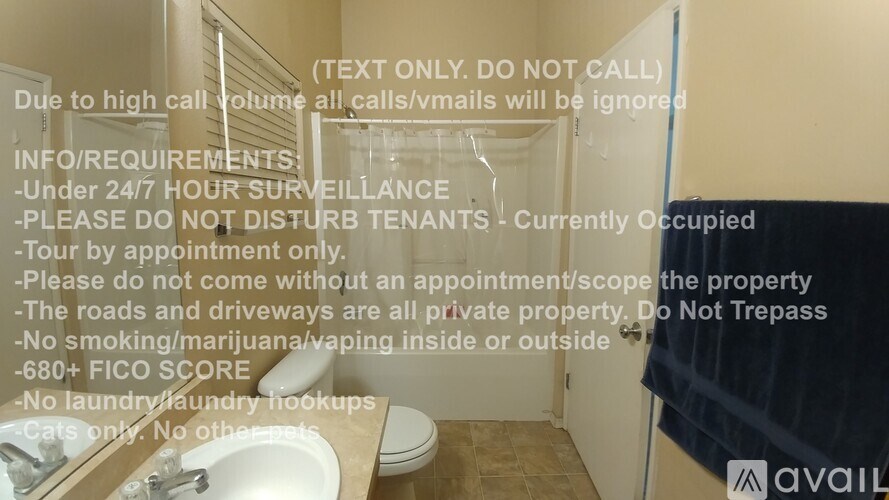 A sign in a bathroom outlines the rules and requirements for a rental property.