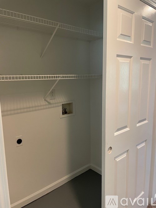 A white door is on the right side of the image.