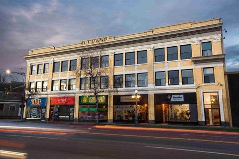 A building with the word FUELAND on the top of it.