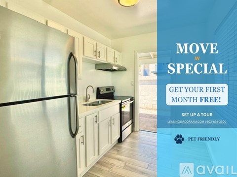 A kitchen with a refrigerator, sink, and cabinets is advertised for rent.