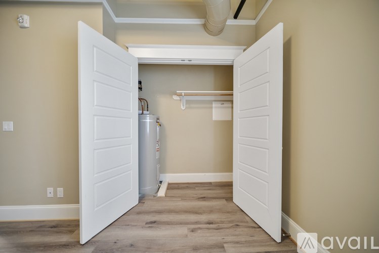 A room with a white door is available for rent.