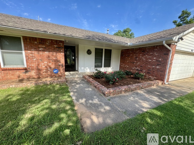 A house with a brick exterior and a white door.