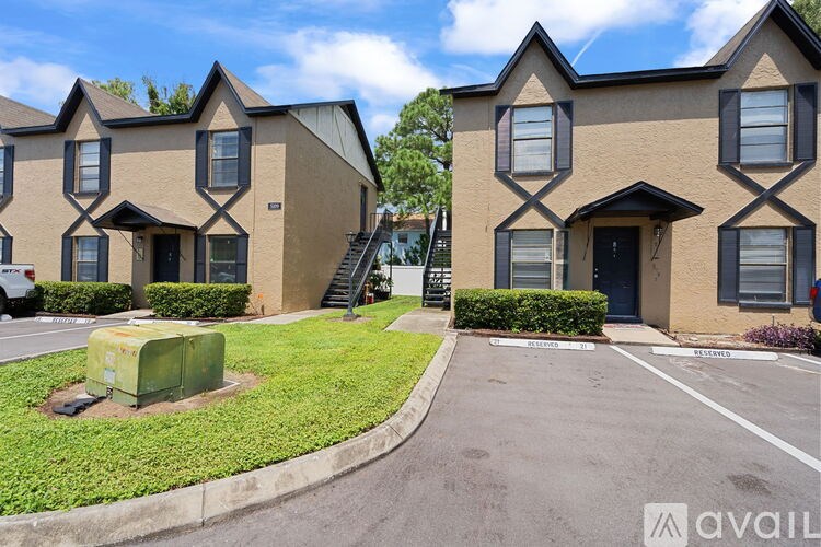A row of houses with a sign that says "available" in the foreground.
