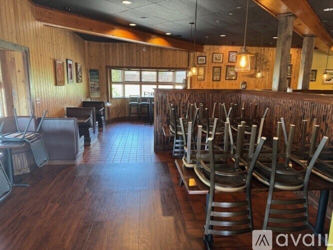 A row of chairs are lined up in a room.