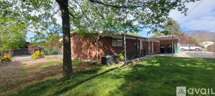 A house with a brown exterior is available for rent.