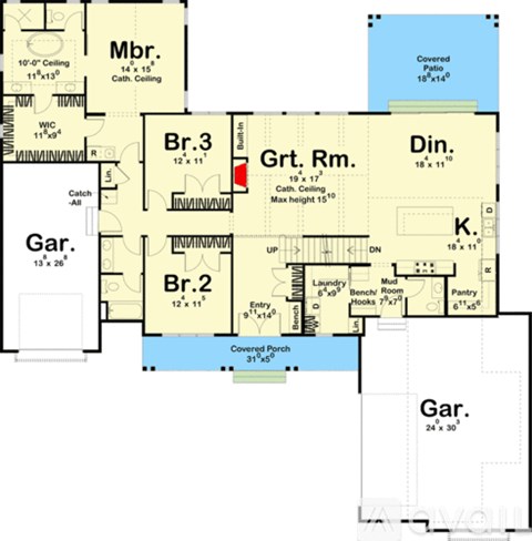 A floor plan of a house with a garage, living room, dining room, kitchen, and bathrooms.