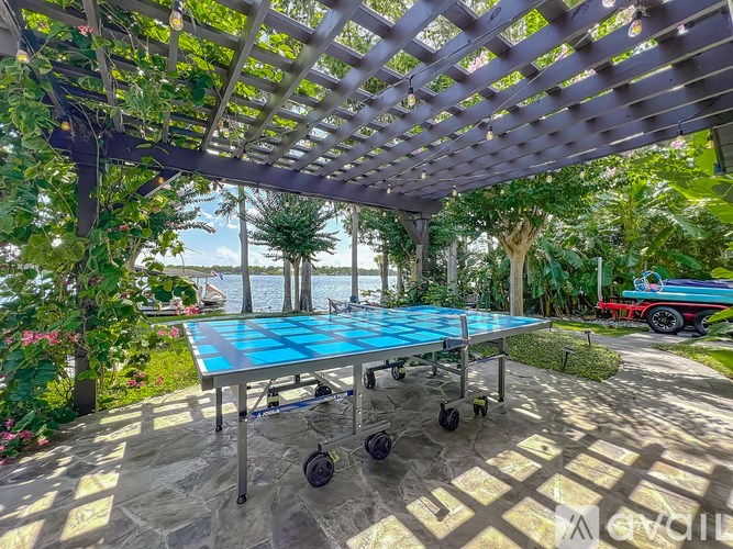 A table tennis table is set up on a patio.