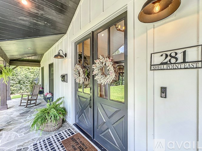 A house number 281 with a wreath on the door.