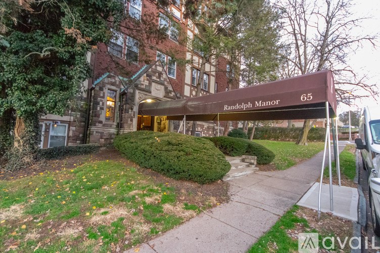 A building with a sign that says Randolph Manor 65.