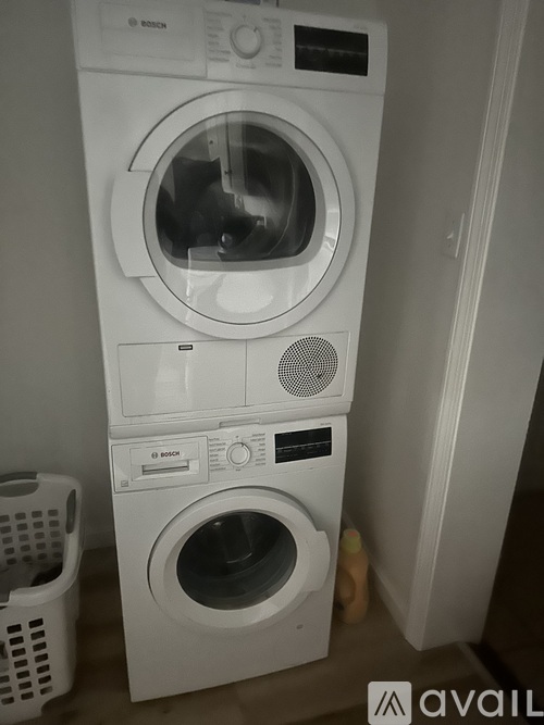 A Bosch washing machine with the door open.