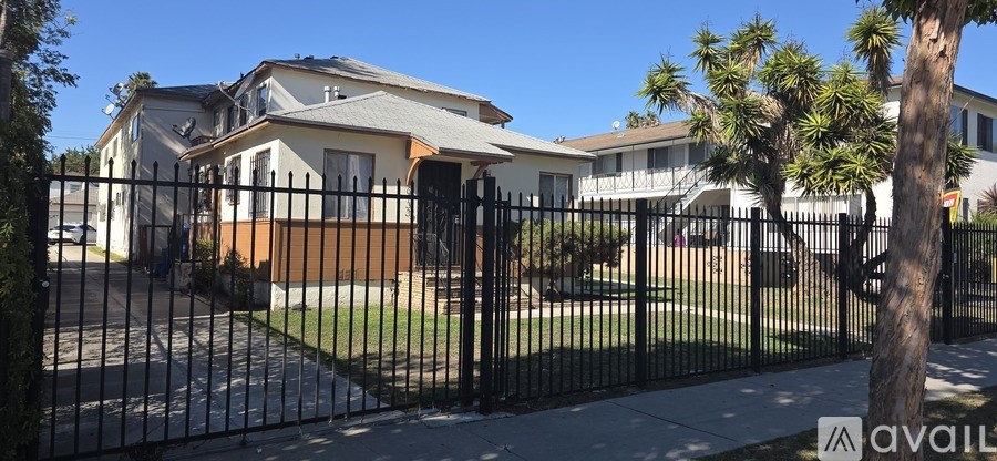 A room with a window and a door.