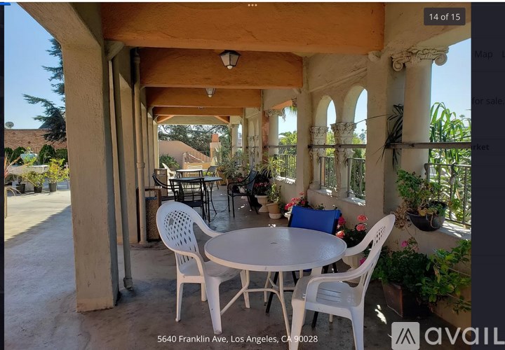 A patio with a table and chairs is shown.