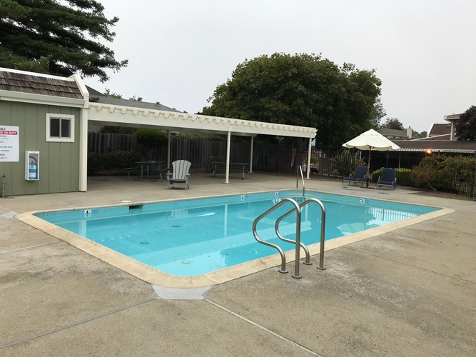 A small pool with a diving board.