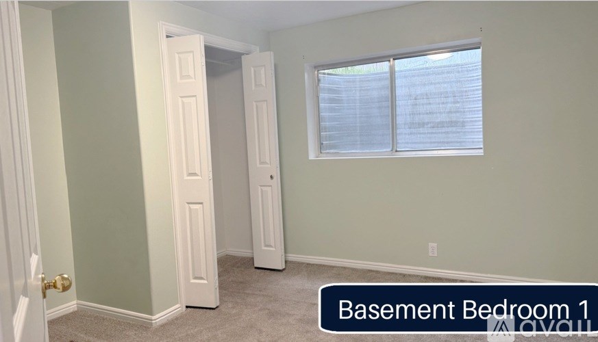 Basement Bedroom 1 is empty and waiting to be furnished.