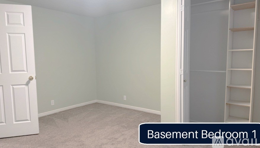 Basement Bedroom 1 is empty and waiting to be furnished.