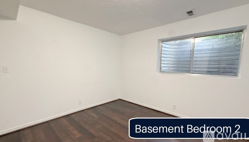 Basement Bedroom 2 is empty and waiting to be furnished.