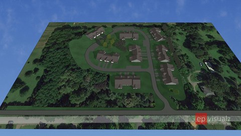 A bird's eye view of a residential area with houses and greenery.
