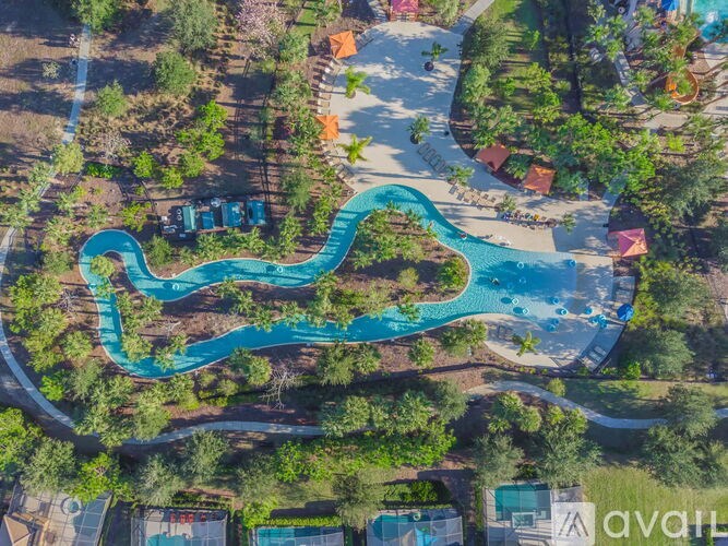 A blue water slide in a park.