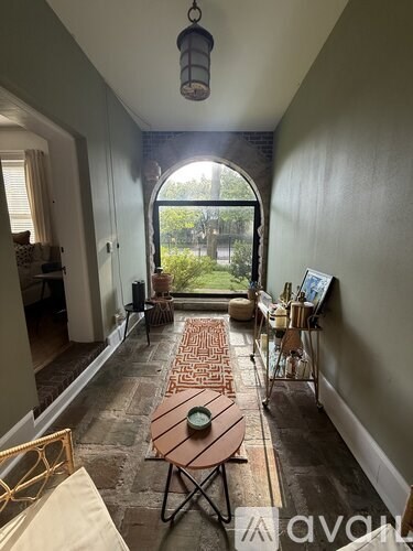A patio with a table and chairs is shown.