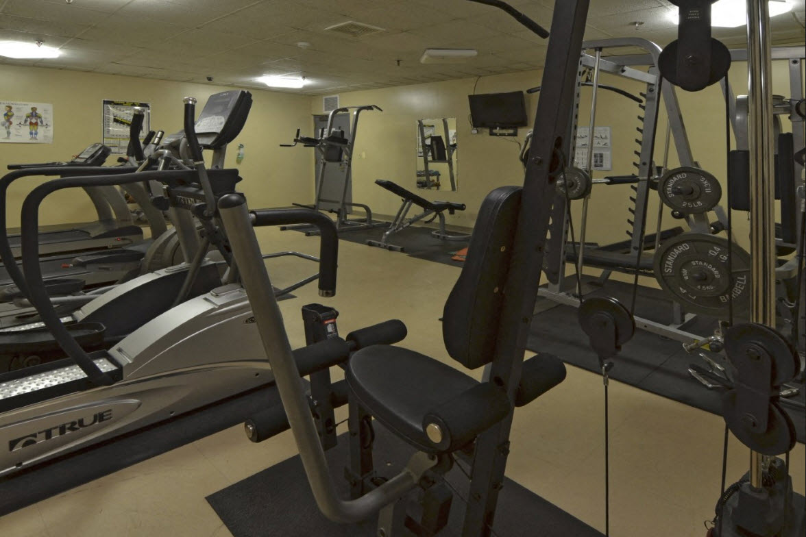 a gym with weights and other exercise equipment