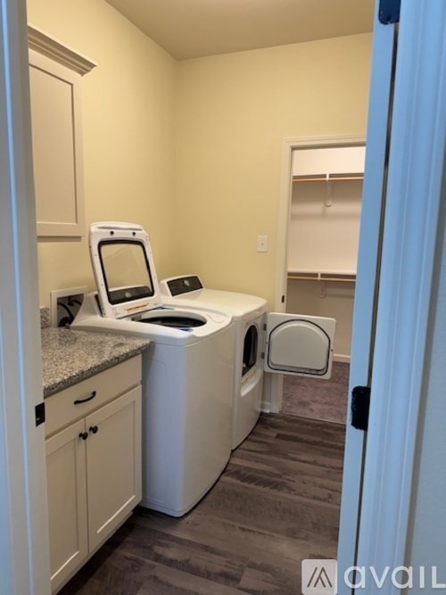 A medical device sits on a counter in a room.