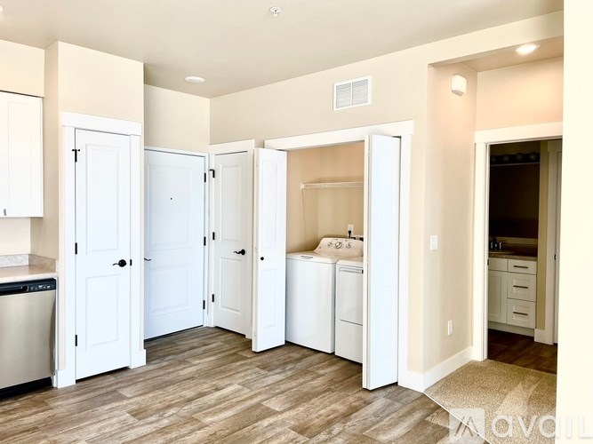 A laundry room with a washer and dryer.