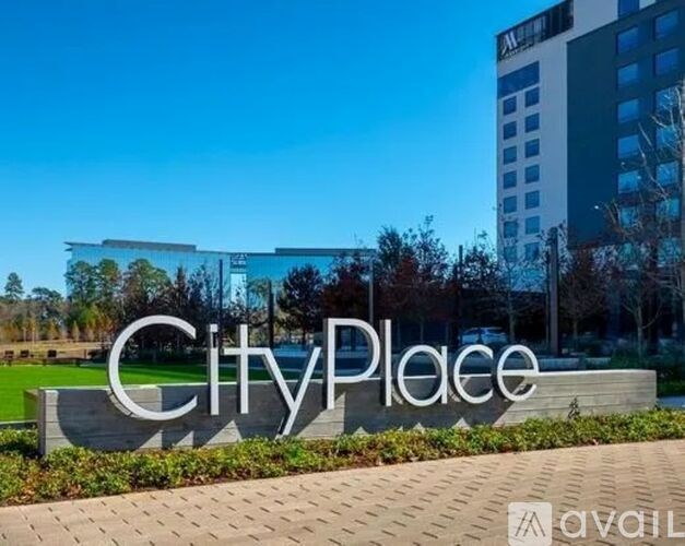 A sign that says CityPlace in front of a building.
