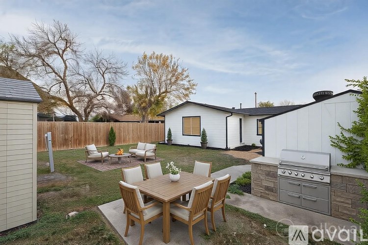 A bathroom with a marble countertop and a wooden bowl on it.