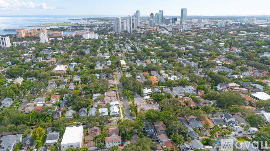 A cityscape with a mix of residential and commercial buildings.