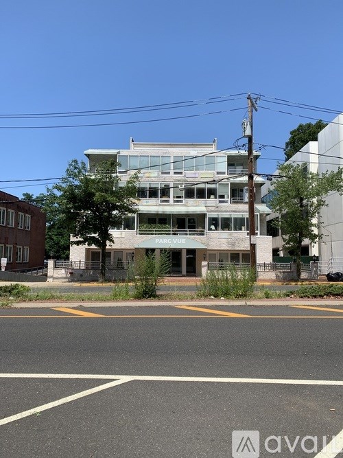 A building with the word "PARKVUE" on it is in the background.