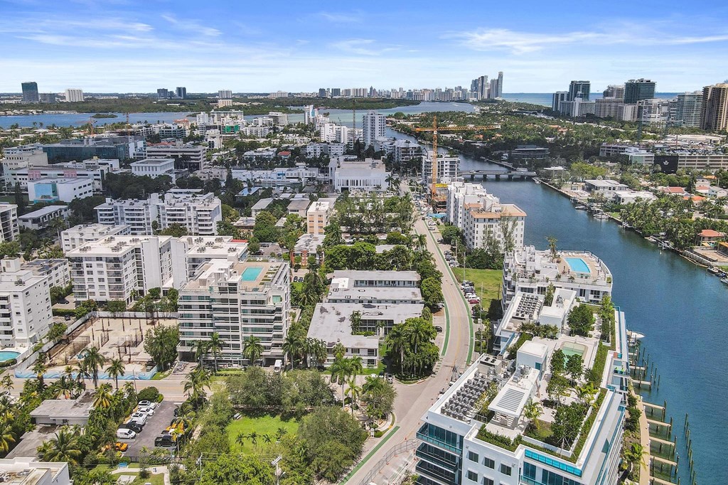 A cityscape with a river running through it.