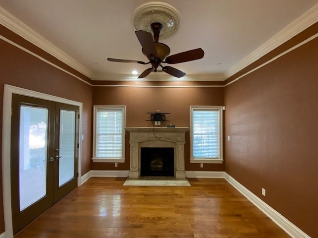A room with a fireplace and a ceiling fan.