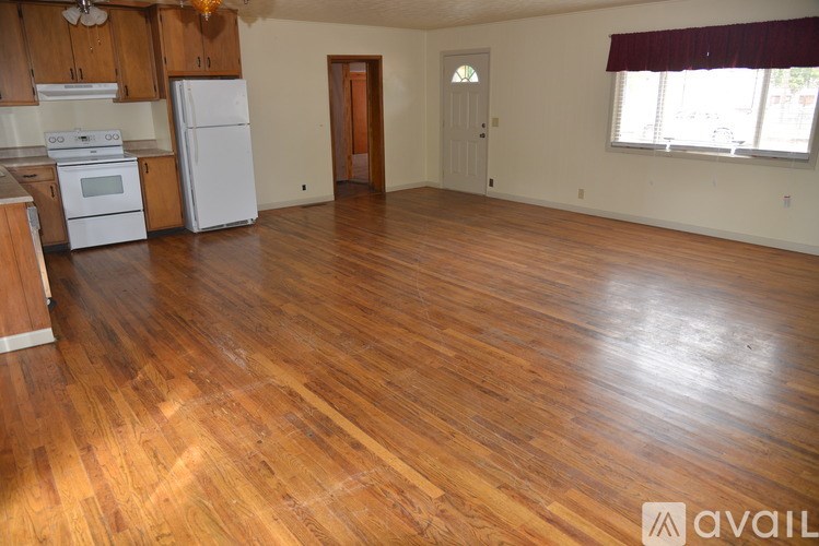 A living room with a fireplace and a couch.