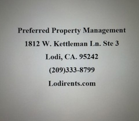 A piece of paper with the heading Preferred Property Management and contact information for a company.