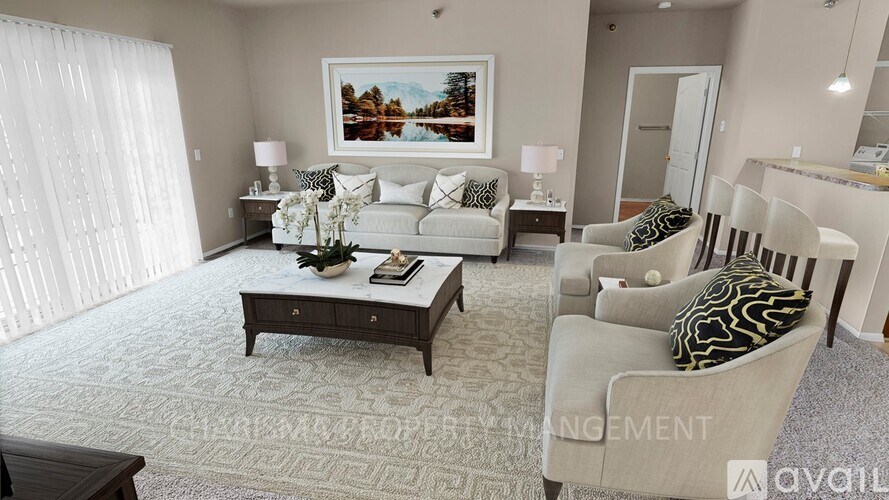 A living room with a sofa, armchairs, and a coffee table.