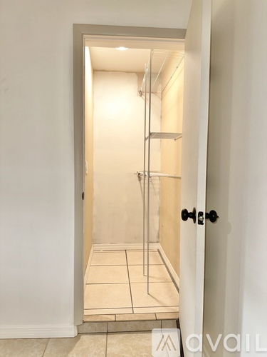 A bathroom with a walk-in shower and a toilet.