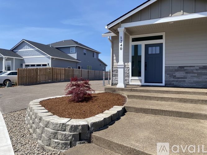 A house numbered 1234 is shown with a front yard and a small tree.
