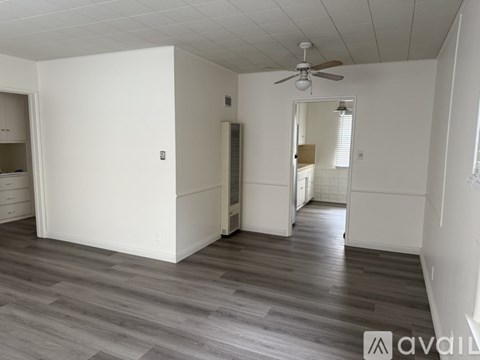 A white bathtub with a hole in the side.