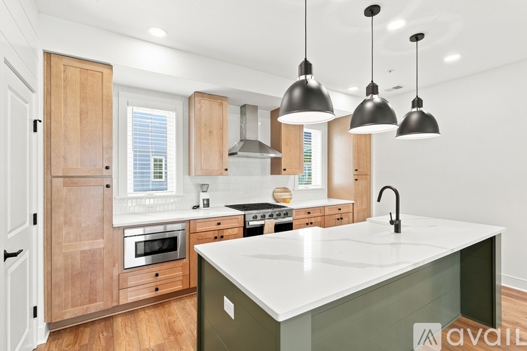 A floor plan for a lower level apartment with a kitchen, living room, and bathrooms.