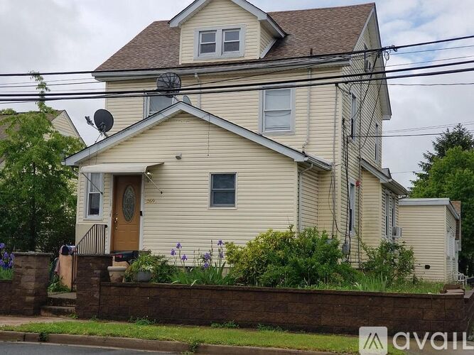 A house with a brown door and a brown window.