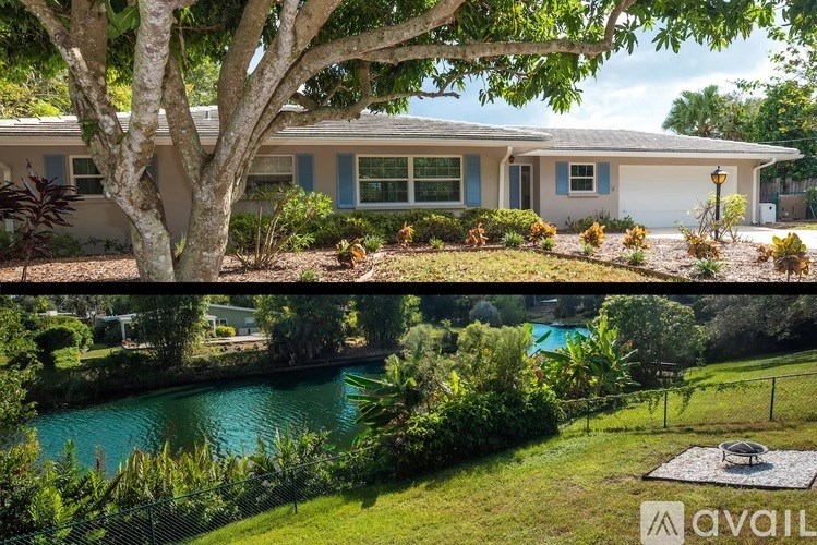 A house with a tree in front of it.