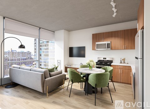A modern kitchen with a dining table and chairs.