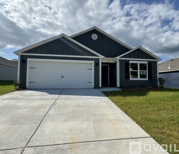 A two-car garage is attached to a house.