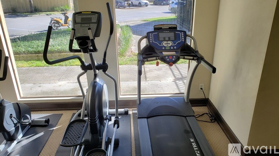 A treadmill and an exercise bike are available for use.